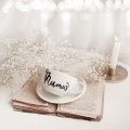 Biała filiżanka porcelanowa 250 ml ze spodkiem - motyw złotego serca z napisem Mamuś dla mamy na Dzień Matki Eleganckie opakowanie prezentowe filiżanki porcelanowej ze złotym sercem nadzwyczajnie.mom — ze spodkiem - Mamuś