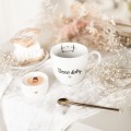 Biały kubek porcelanowy 300 ml - napis dzień dobry kotku ze złotym sercem na walentynki dla ukochanej osoby Biały kubek porcelanowy nadzwyczajnie.mom ze złotym sercem i napisem Dzień dobry kotku — 300 ml