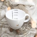 Biały kubek porcelanowy 1 litra - motyw miarki na herbatki dla miłośników naparów na urodziny Eleganckie opakowanie prezentowe kubka porcelanowego ze złotym sercem nadzwyczajnie.mom — Kubek 1 litr - Miarka na herbatki